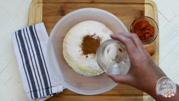 mixing dry ingredients in a clear bowl