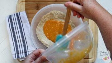 combining dry and wet ingredients into a bowl