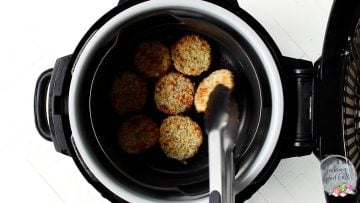 flipping fried green tomatoes in the air fryer