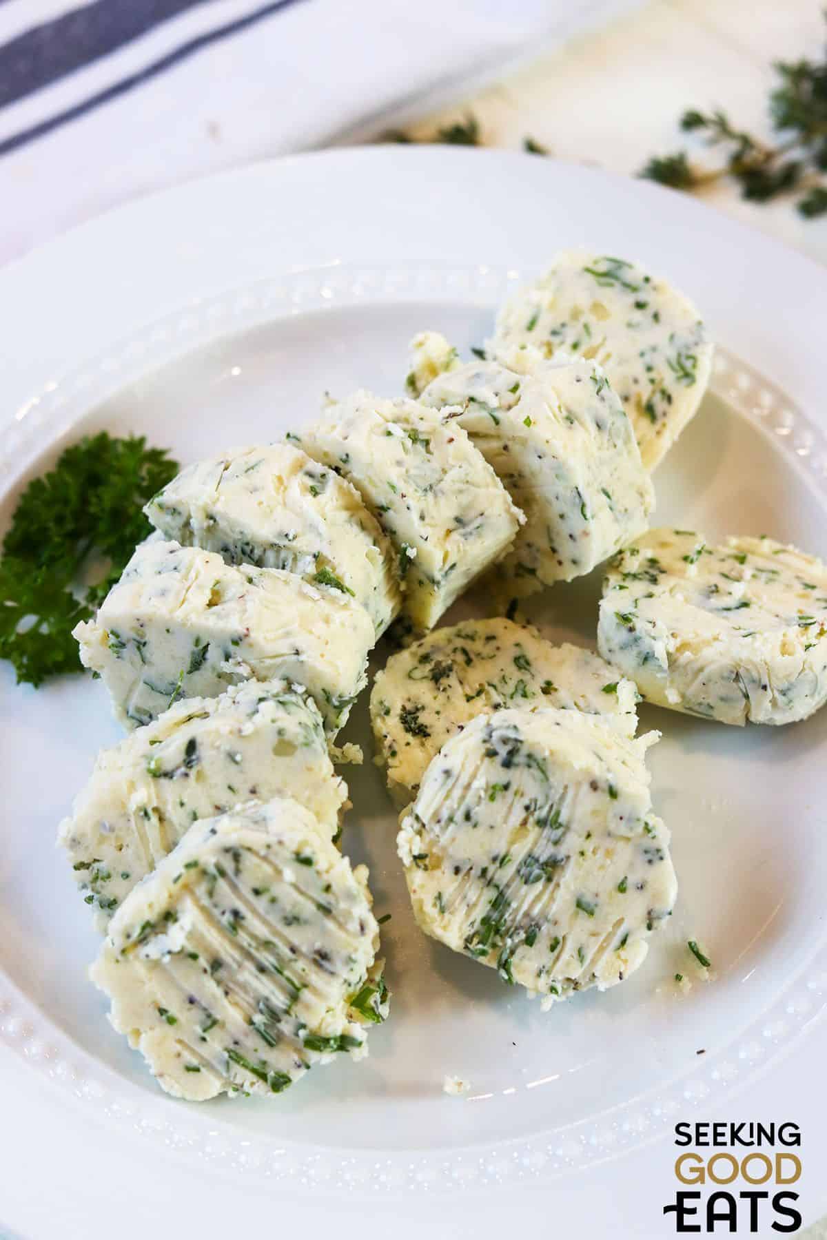 Sliced compound butter with garlic and herbs.