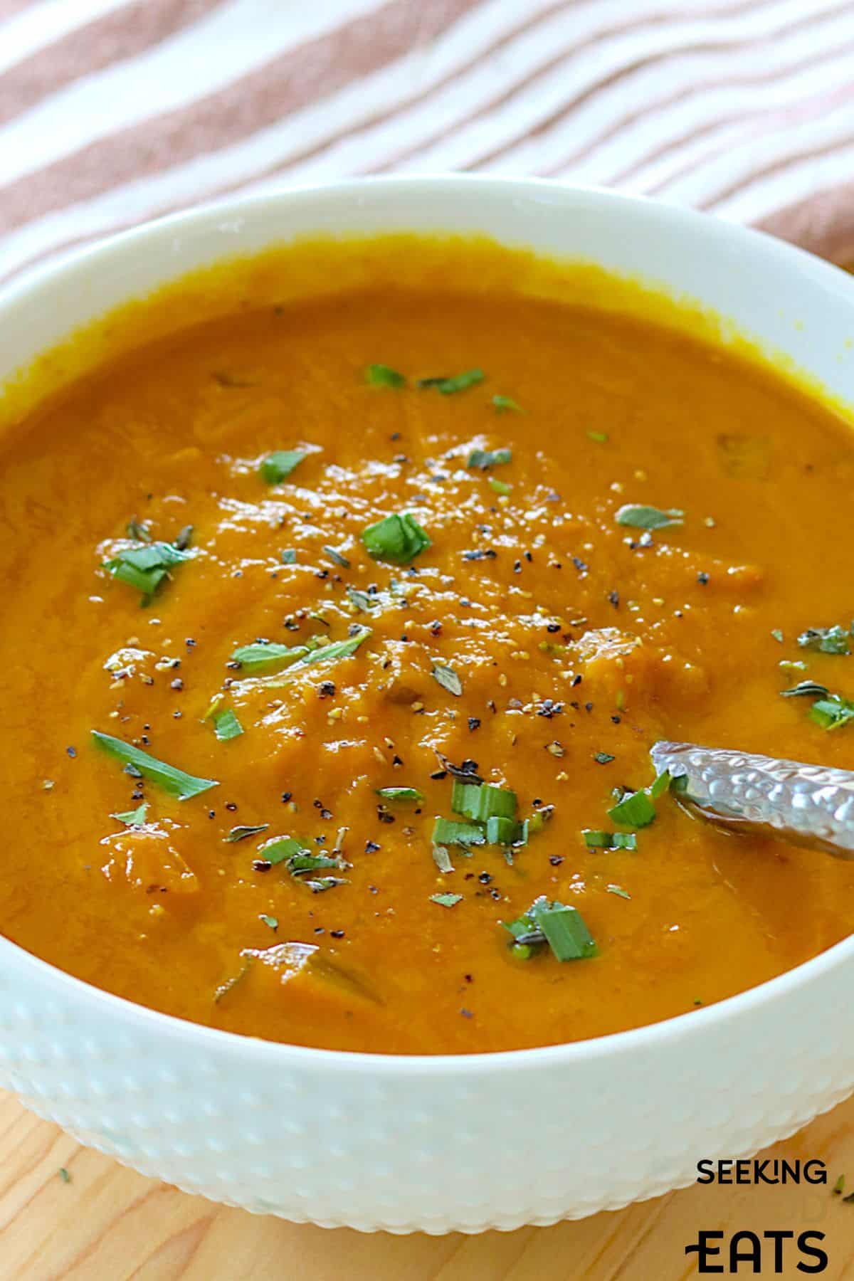 A close up view of pumpkin soup made in the crockpot.