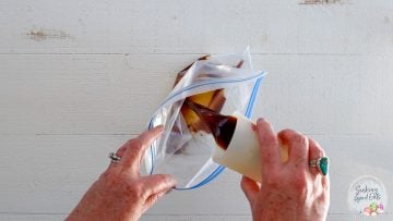 adding the marinade ingredients to the plastic bag