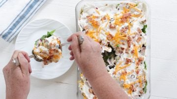serving the layered salad.