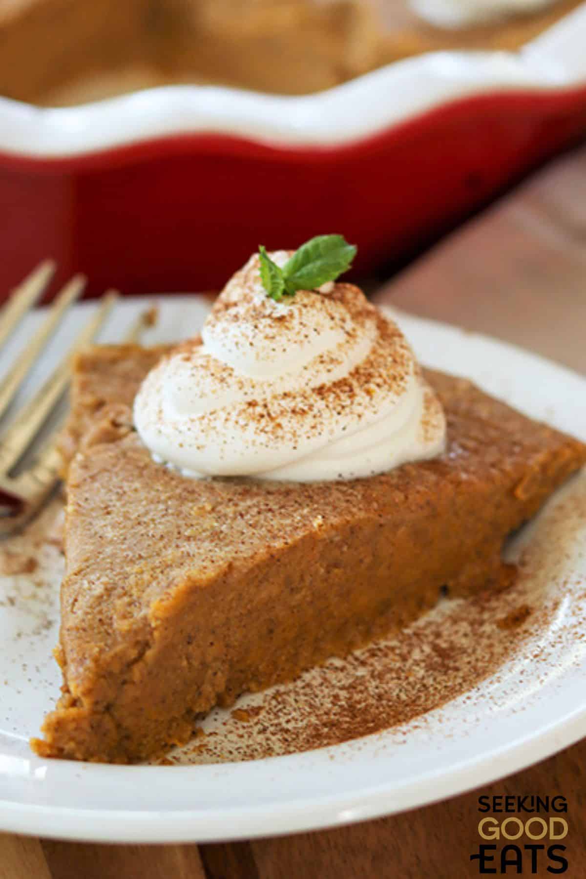 Slice of crustless pumpkin pie with a fork on the side.