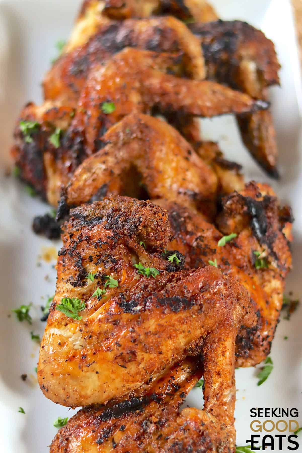 Crispy BBQ chicken wings plated.