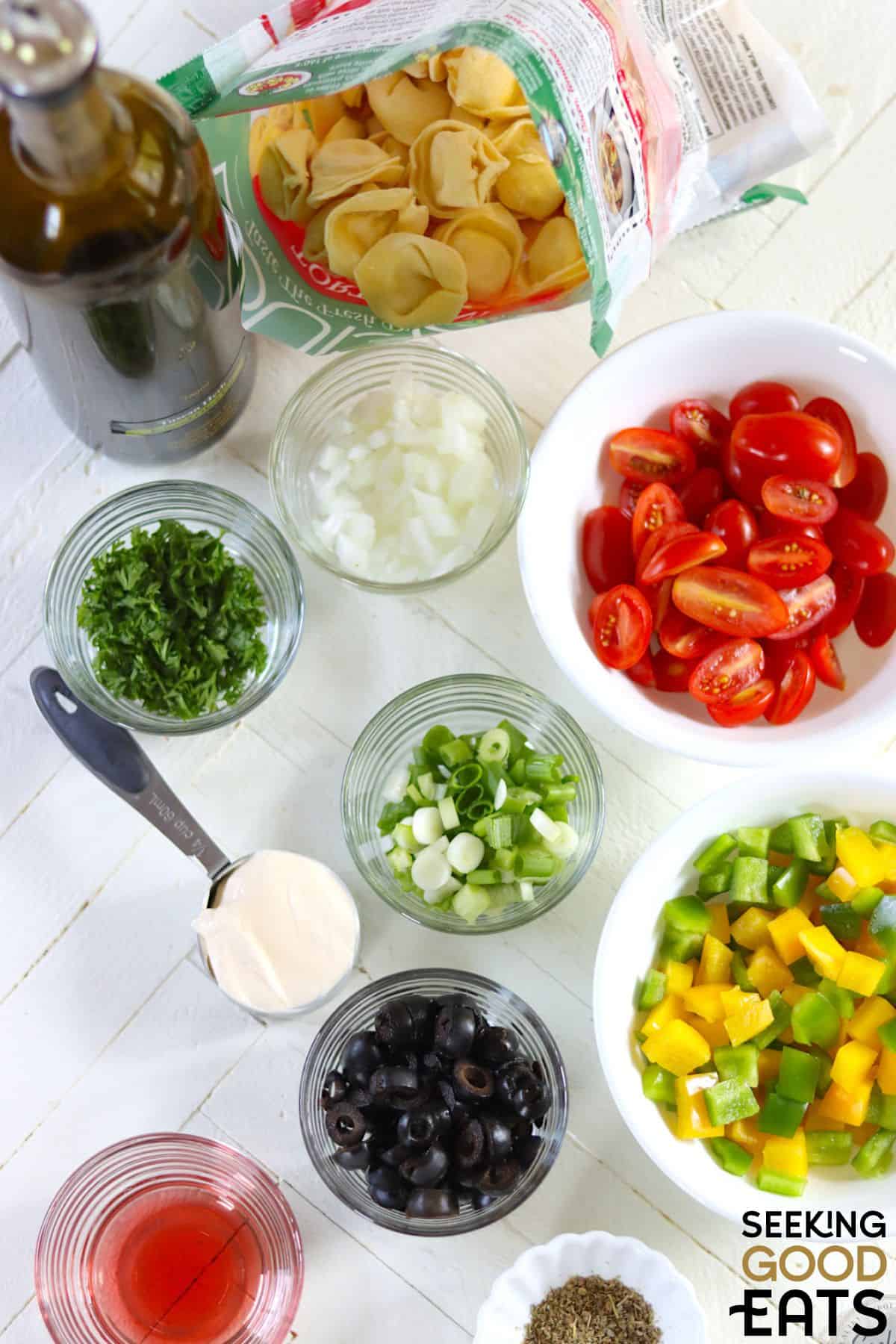 Image of ingredients needed to make creamy tortellini pasta salad.