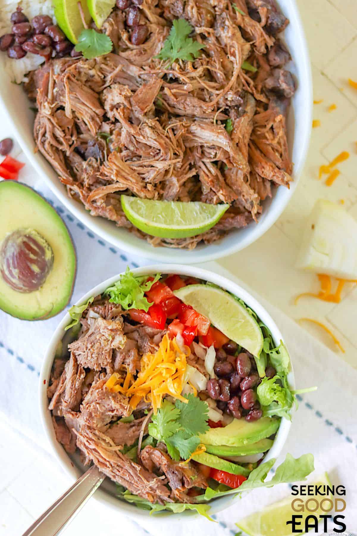 A bowl of copycat Chipotle Barbacoa served in a bowl with a spoon.