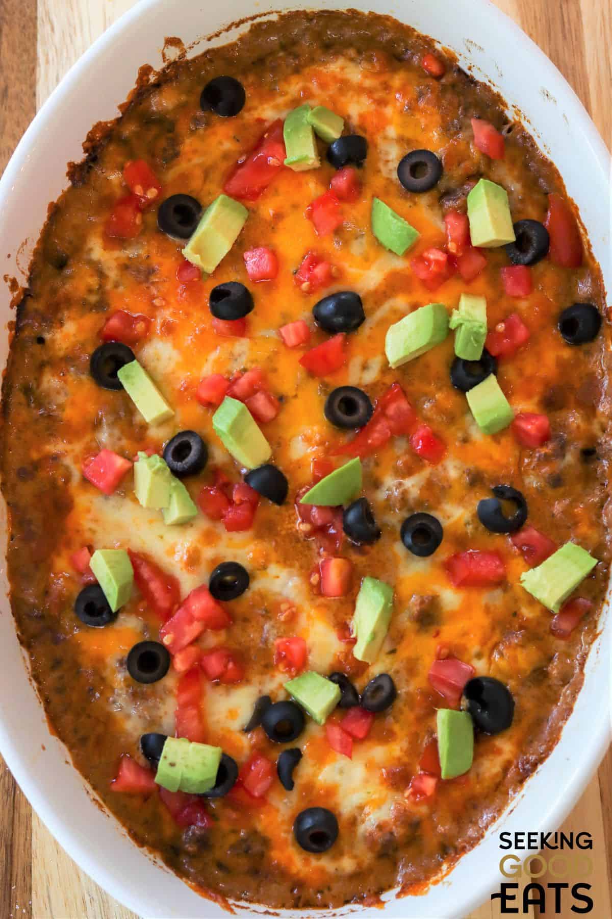 Low carb taco casserole with toppings.