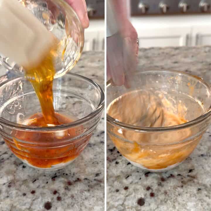 Making homemade bang bang sauce in a clear glass bowl.