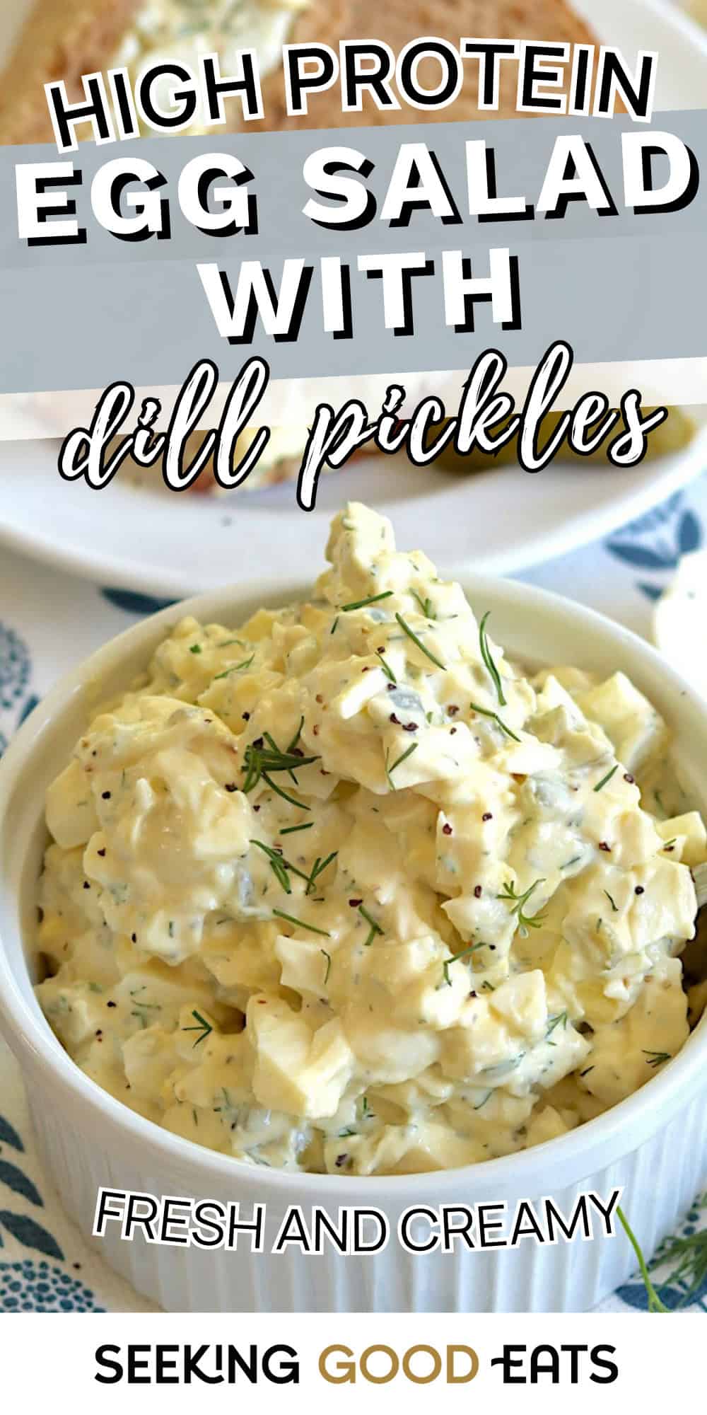 A bowl of creamy egg salad with dill pickles and herbs, made with hard boiled eggs for a high protein meal.