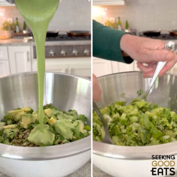 Pouring green goddess dressing onto green goddess salad recipe ingredients in a silver mixing bowl, and tossing all ingredients together with two silver forks.