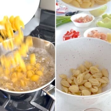 Cooking the pasta for the seafood pasta salad in a pot on the stove.