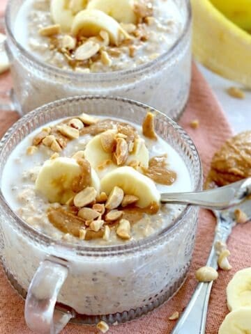 Bananas, peanuts, and peanut butter drizzled over the top of peanut butter banana overnight oats.