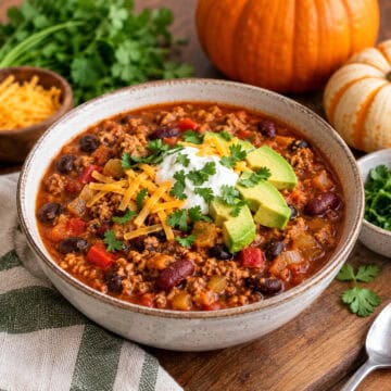 Turkey chili in a white bowl.