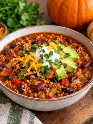 Turkey chili in a white bowl.